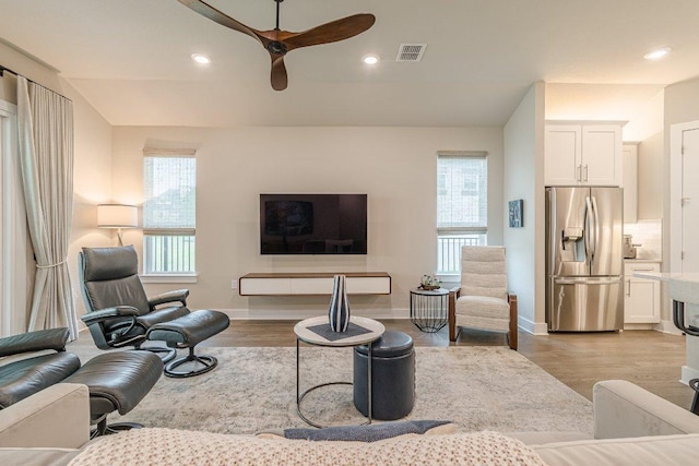 433 Skipping Cedar St, San Marcos, TX 78666 - living room featuring a ceiling fan, wood finished floors, baseboards, and recessed lighting