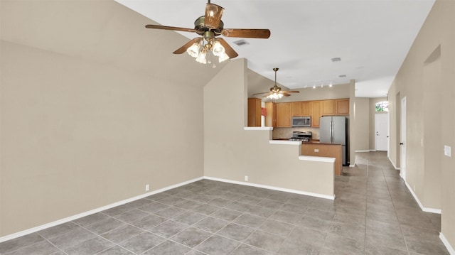 1803 Shooting Star Cv, Cedar Park, TX 78613 - kitchen featuring stainless steel appliances, ceiling fan, a peninsula, light tile patterned flooring, and lofted ceiling