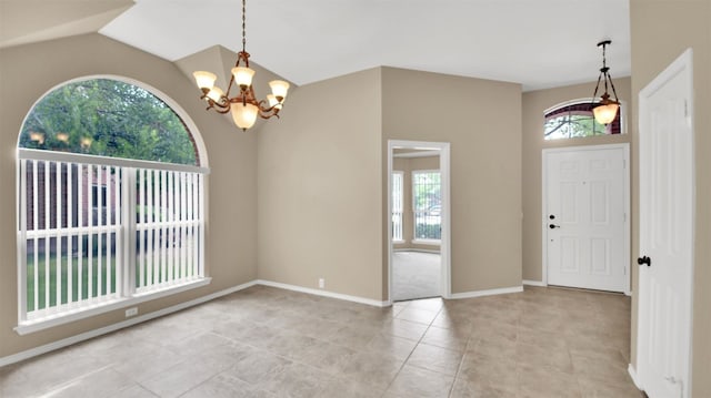 1803 Shooting Star Cv, Cedar Park, TX 78613 - entrance foyer with plenty of natural light, a chandelier, light tile patterned flooring, and lofted ceiling