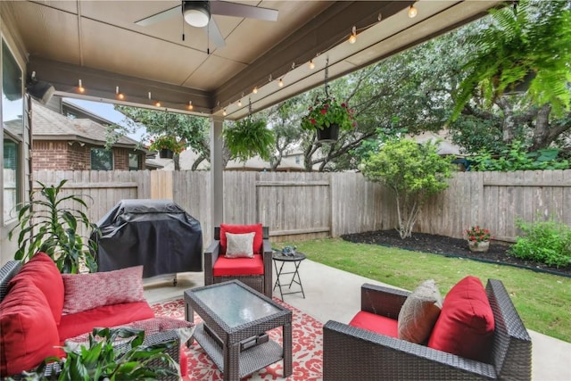 2228 Hilltop Climb Dr, Leander, TX 78641 - fenced backyard with an outdoor hangout area, area for grilling, ceiling fan, and a patio