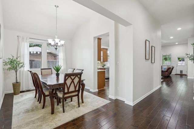 2228 Hilltop Climb Dr, Leander, TX 78641 - dining area featuring a chandelier, dark wood-style flooring, recessed lighting, and vaulted ceiling
