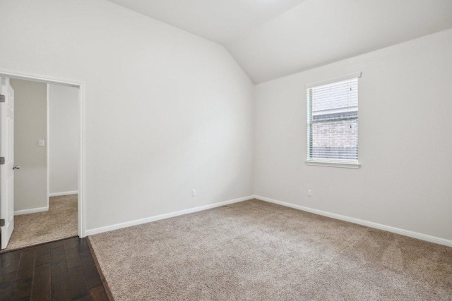 2228 Hilltop Climb Dr, Leander, TX 78641 - unfurnished room featuring lofted ceiling, baseboards, and dark wood finished floors