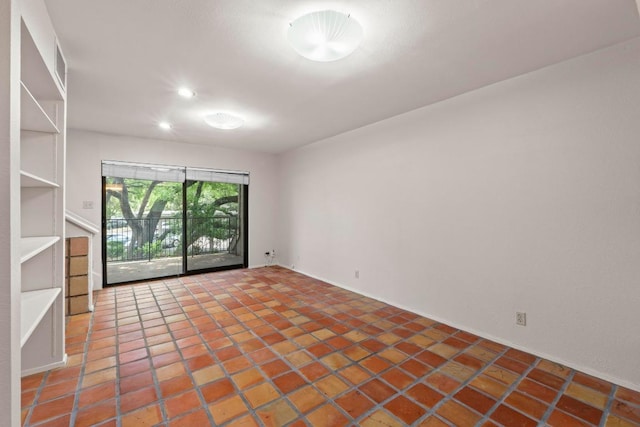 1135 Barton Hills Dr Unit 240, Austin, TX 78704 - tiled spare room featuring recessed lighting