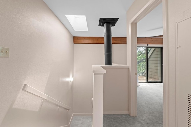 1135 Barton Hills Dr Unit 240, Austin, TX 78704 - stairs featuring carpet flooring and a skylight