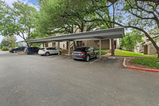 1135 Barton Hills Dr Unit 240, Austin, TX 78704 - covered parking lot with stairway