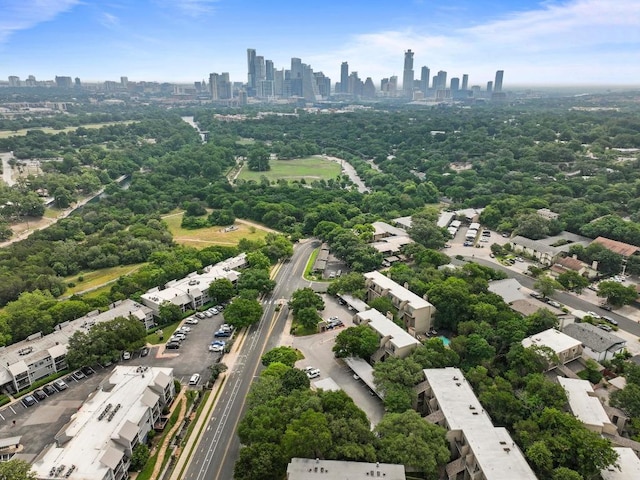 1135 Barton Hills Dr Unit 240, Austin, TX 78704 - aerial view of skyline and a tree filled landscape