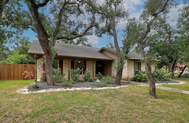 9417 Longvale Dr, Austin, TX 78729 - ranch-style house with stone siding and a shingled roof