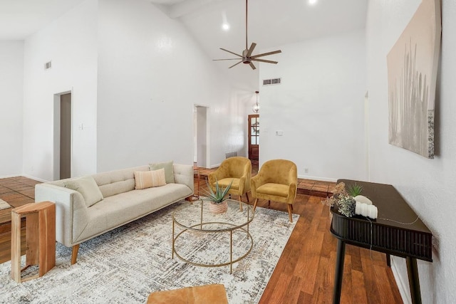 9417 Longvale Dr, Austin, TX 78729 - living area featuring high vaulted ceiling, ceiling fan, wood finished floors, recessed lighting, and beam ceiling