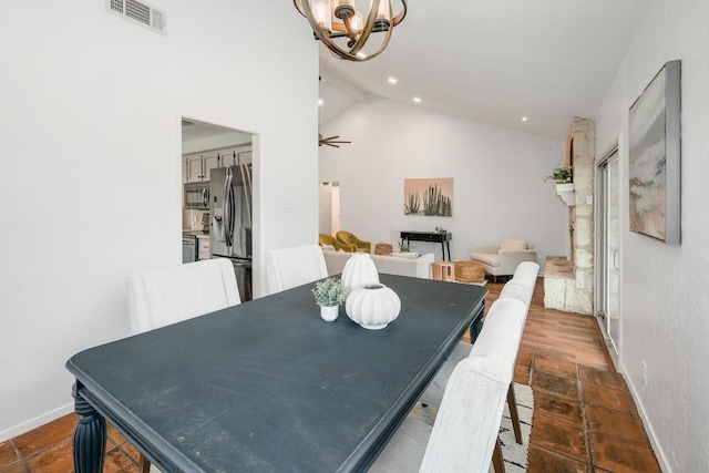 9417 Longvale Dr, Austin, TX 78729 - dining space featuring lofted ceiling, a chandelier, recessed lighting, and baseboards