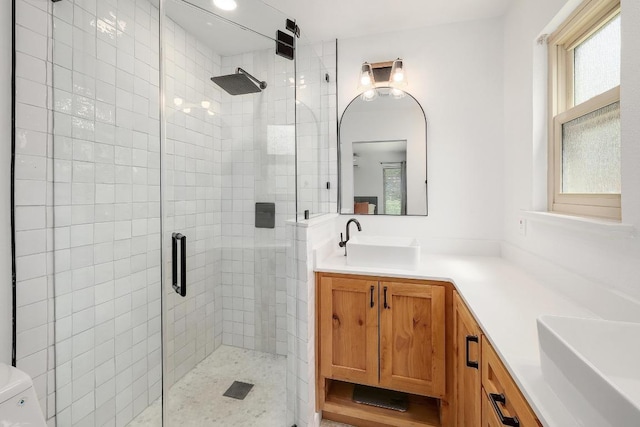 9417 Longvale Dr, Austin, TX 78729 - bathroom featuring a shower stall, vanity, and toilet