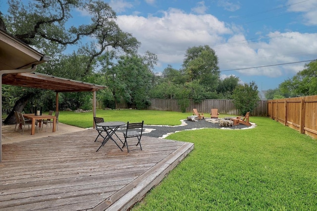 9417 Longvale Dr, Austin, TX 78729 - view of yard with outdoor dining area, an outdoor fire pit, and a wooden deck