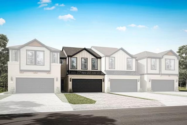 2725 Woodall Dr Unit 1602, Cedar Park, TX 78613 - townhome / multi-family property featuring a garage, a standing seam roof, driveway, and metal roof