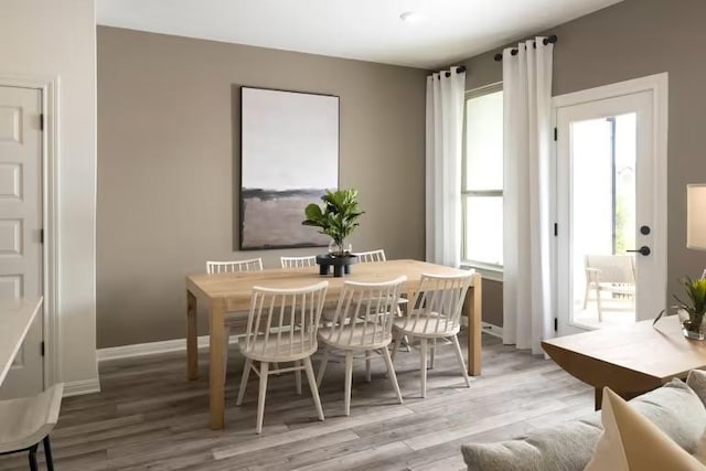 2725 Woodall Dr Unit 1602, Cedar Park, TX 78613 - dining room featuring light wood-style floors and baseboards