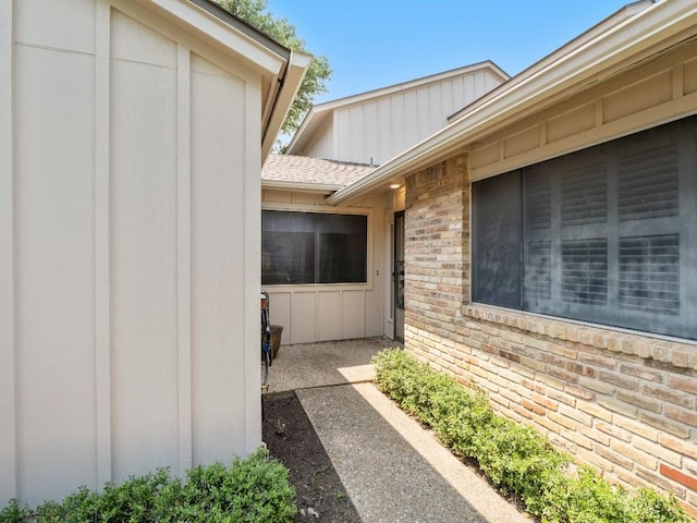 3700 Steck Ave, Austin, TX 78759 - view of property exterior featuring brick siding and board and batten siding