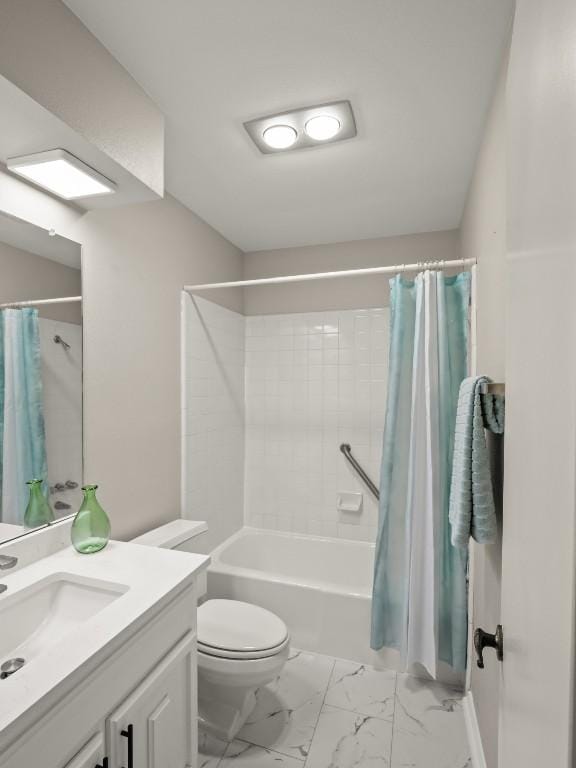 3700 Steck Ave, Austin, TX 78759 - full bathroom featuring toilet, vanity, marble look tiles, and shower / tub combo