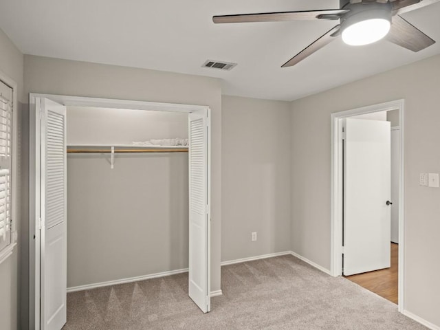 3700 Steck Ave, Austin, TX 78759 - unfurnished bedroom with carpet flooring, a closet, baseboards, and a ceiling fan
