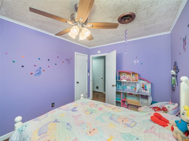 302 Vernon St, Thrall, TX 76578 - bedroom with ornamental molding and ceiling fan