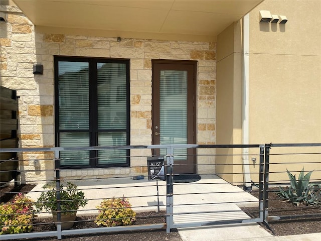 104 Bella Toscana Ave Unit 2106, Austin, TX 78734 - property entrance featuring stone siding and stucco siding
