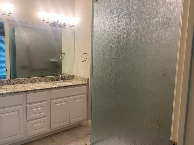 104 Bella Toscana Ave Unit 2106, Austin, TX 78734 - bathroom featuring a shower stall, vanity, and tile patterned floors
