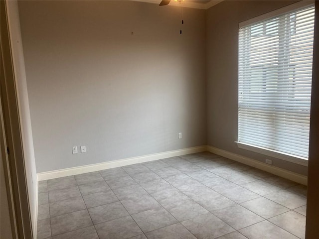 104 Bella Toscana Ave Unit 2106, Austin, TX 78734 - empty room featuring ceiling fan, baseboards, plenty of natural light, and light tile patterned flooring
