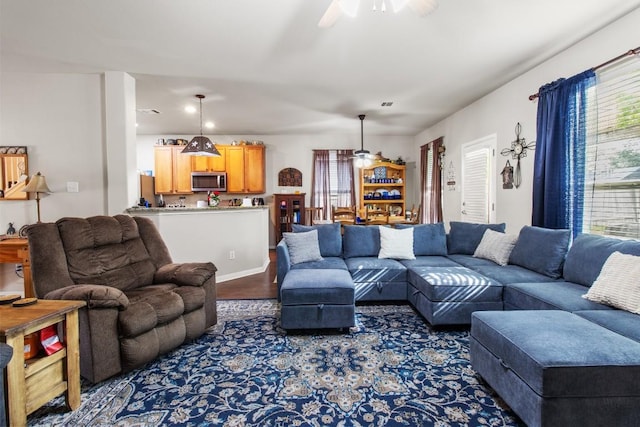 1115 Henderson Dr, Leander, TX 78641 - living area featuring a ceiling fan and wood finished floors