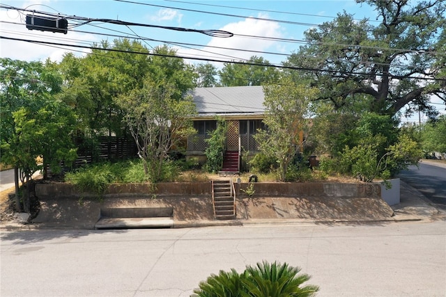 1001 Catalpa St, Austin, TX 78702 - view of property hidden behind natural elements featuring stairway