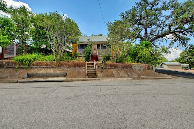 1001 Catalpa St, Austin, TX 78702 - view of front of home featuring stairs