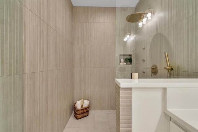 18408 F M Road 1431, Jonestown, TX 78645 - full bathroom featuring a walk in shower, tile patterned floors, and tile walls