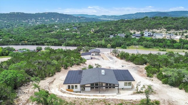 18408 F M Road 1431, Jonestown, TX 78645 - aerial view of property and surrounding area with a mountain backdrop and a forest