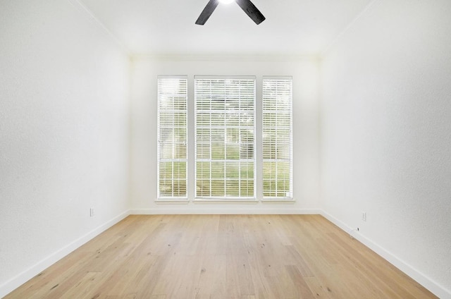 6116 Pebble Garden Ct, Austin, TX 78739 - empty room with ornamental molding, a ceiling fan, baseboards, and light wood finished floors