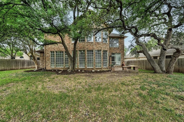 6116 Pebble Garden Ct, Austin, TX 78739 - rear view of property with brick siding