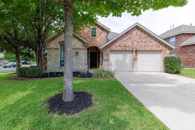 4308 Clear Meadow Pl, Round Rock, TX 78665 - traditional home featuring an attached garage, concrete driveway, a front lawn, stone siding, and brick siding