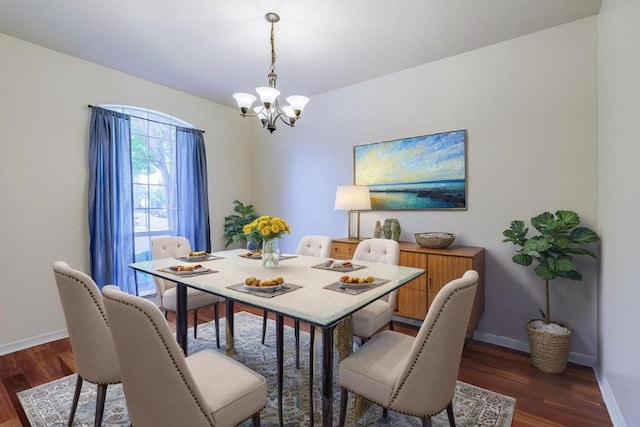 4308 Clear Meadow Pl, Round Rock, TX 78665 - dining room with wood finished floors, a chandelier, and baseboards