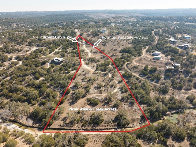 141 Hill Cv, Dripping Springs, TX 78620 - aerial view of property and surrounding area with property boundaries highlighted