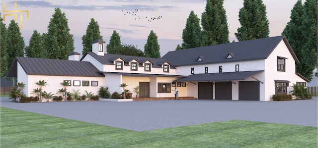 141 Hill Cv, Dripping Springs, TX 78620 - modern farmhouse with a front lawn, a chimney, a garage, and metal roof