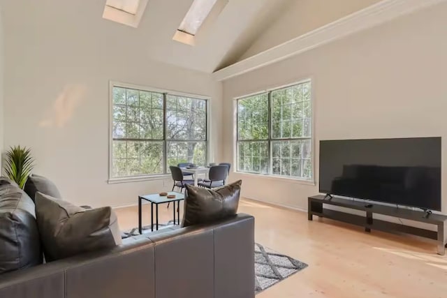 1202 Loma Dr, Austin, TX 78741 - office area featuring a skylight, vaulted ceiling, and wood finished floors
