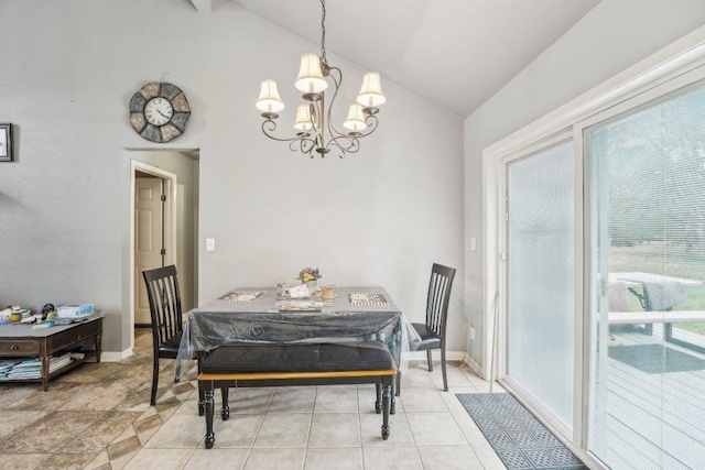 156 Kaeleku Ln, Bastrop, TX 78602 - dining area featuring a chandelier, high vaulted ceiling, and baseboards