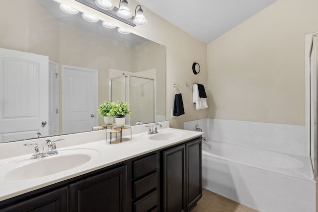 1610 Discovery Blvd, Cedar Park, TX 78613 - full bathroom with a shower stall, a garden tub, double vanity, and tile patterned floors