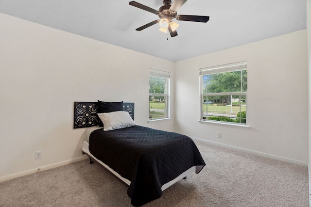 1610 Discovery Blvd, Cedar Park, TX 78613 - carpeted bedroom featuring baseboards and a ceiling fan