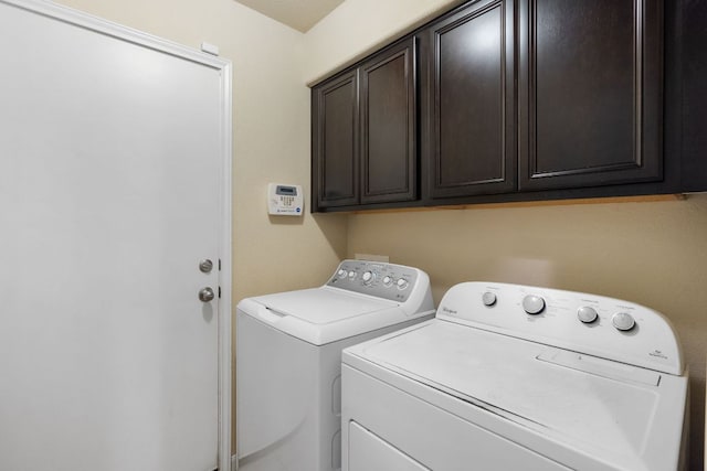 1610 Discovery Blvd, Cedar Park, TX 78613 - laundry area with washing machine and clothes dryer and cabinet space