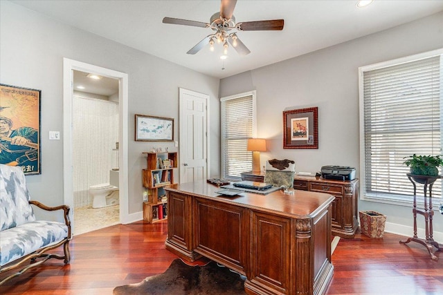 6012 Messenger Stake, Austin, TX 78746 - office area with dark wood finished floors, ceiling fan, and baseboards