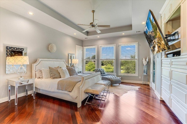 6012 Messenger Stake, Austin, TX 78746 - bedroom with baseboards, a tray ceiling, wood finished floors, recessed lighting, and ceiling fan