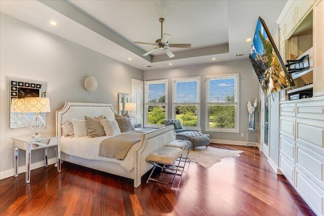 6012 Messenger Stake, Austin, TX 78746 - bedroom with a tray ceiling, wood finished floors, recessed lighting, and ceiling fan