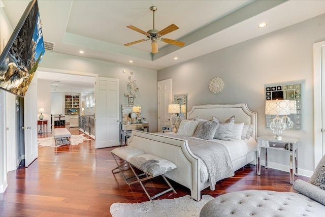 6012 Messenger Stake, Austin, TX 78746 - bedroom with wood finished floors, recessed lighting, a raised ceiling, baseboards, and ceiling fan