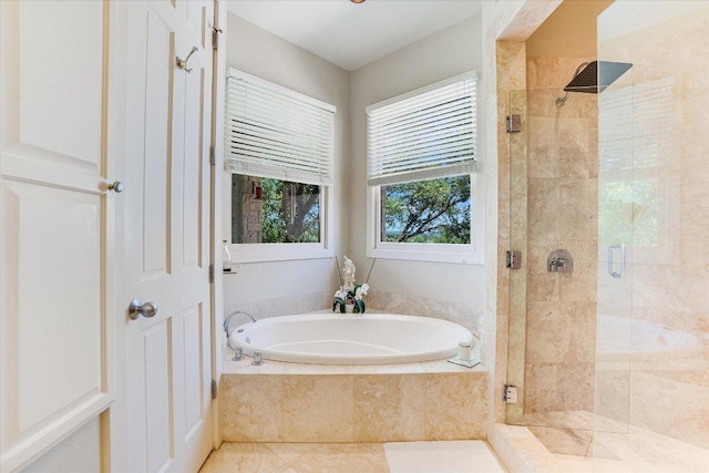 6012 Messenger Stake, Austin, TX 78746 - bathroom featuring a garden tub, a stall shower, and tile patterned flooring