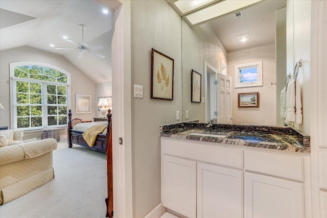 6012 Messenger Stake, Austin, TX 78746 - bathroom with ensuite bath, lofted ceiling, ceiling fan, vanity, and baseboards