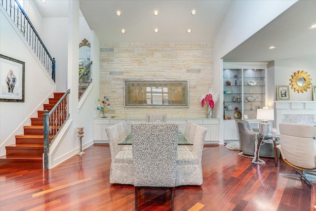 6012 Messenger Stake, Austin, TX 78746 - living area featuring a fireplace, stairs, dark wood-type flooring, and recessed lighting
