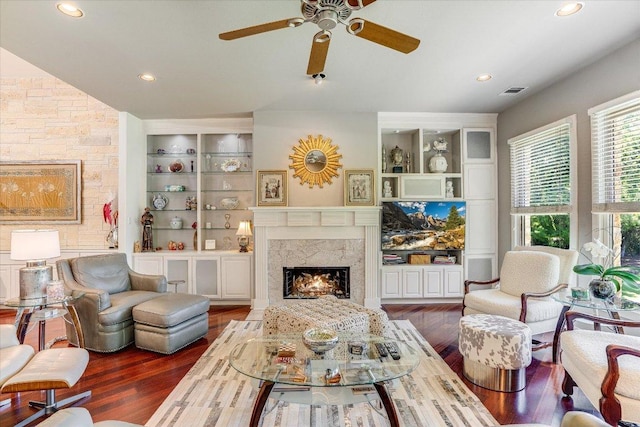 6012 Messenger Stake, Austin, TX 78746 - living room with a high end fireplace, built in features, wood finished floors, a ceiling fan, and recessed lighting