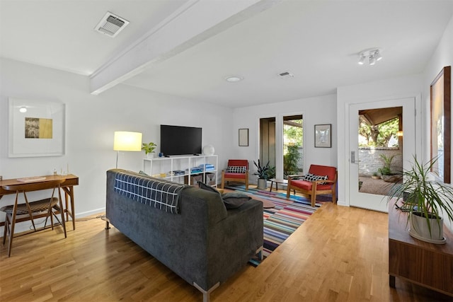 4839 Canyonbend Cir, Austin, TX 78735 - living area featuring wood finished floors, baseboards, and beam ceiling
