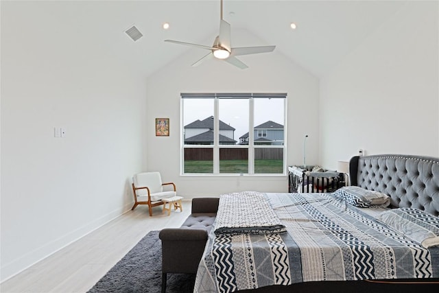 216 Reata Ridge Loop, Liberty Hill, TX 78642 - bedroom featuring lofted ceiling, wood finished floors, a ceiling fan, and baseboards